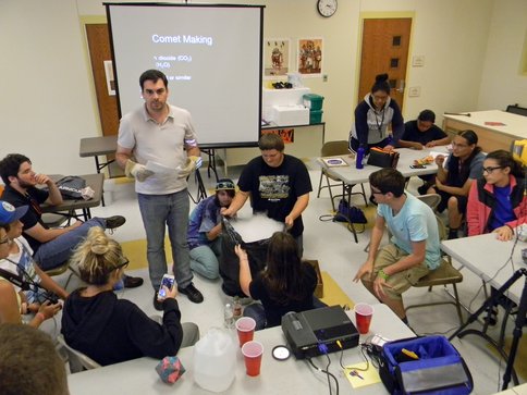 Figure 1.  Dr. Michel Nuevo teaches Choctaw youth how to build a comet at the Choctaw Summer camp held in Hartshorne, OK in July 2015.