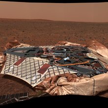 This image mosaic taken by the panoramic camera onboard the Mars Exploration Rover Spirit shows the rover's landing site, the Columbia Memorial Station, at Gusev Crater, Mars.