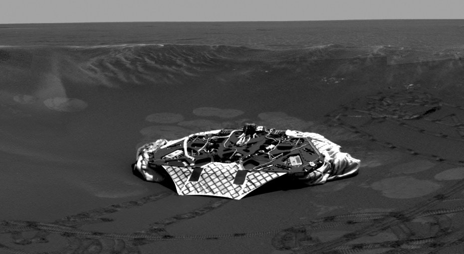 This image mosaic shows a panoramic view of the crater where Opportunity made its its dramatic arrival in late January 2004.