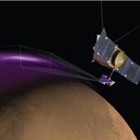 Artist's conception of MAVEN's Imaging UltraViolet Spectrograph (IUVS) observing the "Christmas Lights Aurora" on Mars. MAVEN observations show that aurora on Mars is similar to Earth's "Northern Lights" but has a different origin.