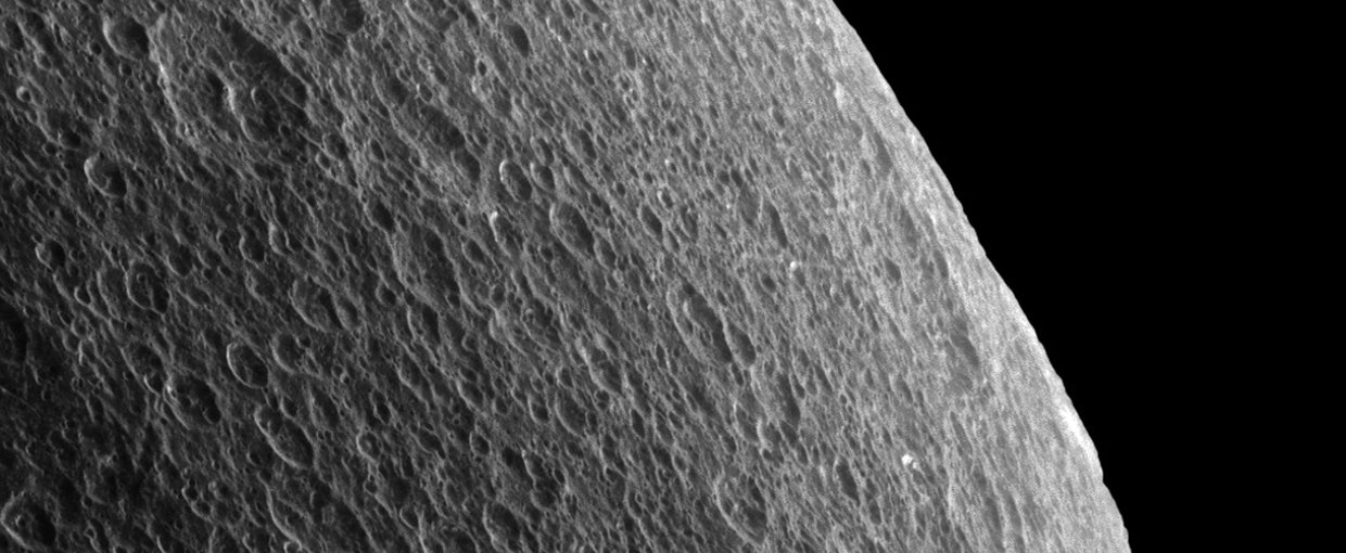 The view was of Saturn's moon Rhea was obtained at a distance of approximately 35,000 miles (56,000 kilometers) from Rhea and at a Sun-Rhea-spacecraft, or phase, angle of 76 degrees. Image scale is 1,100 feet (330 meters) per pixel. Credit: NASA/JPL-Calte