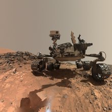 This low-angle self-portrait of NASA's Curiosity Mars rover shows the vehicle at the site from which it reached down to drill into a rock target called "Buckskin." The MAHLI camera on Curiosity's robotic arm took multiple images on Aug. 5, 2015.