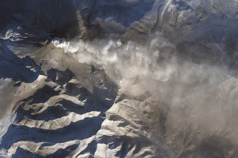 Researchers think emissions from volcanos, such as the one seen here, may have led to a dramatic rise in CO2 leading to a mass extinction 200 million years ago. (Photo/NASA Earth Observatory)