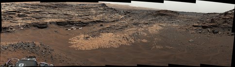 Figure 2. Marias Pass - Contact of two Martian rock units: This view from the Mast Camera (Mastcam) shows the Marias Pass area where an older mudstone unit (pale outcrop in the center of the image) contacts the overlying geological unit of sandstone.
