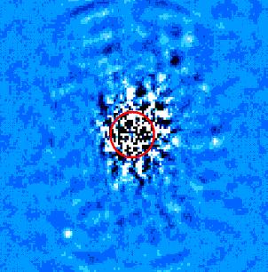 Figure 1. APP image of Procyon after PSF subtraction. The red circle marks 3 λ/D or 0.5” away from the star. The image combines two separate observations at different rotation angles to achieve sensitivity at all position angles around the star. The white dwarf companion, 11 magnitudes fainter is equivalent to a 30 MJ planet around this star and could be seen at approximately 3 AU away.