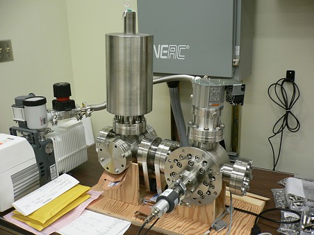 Vacuum housing for the new SCAPS detector on the test bench. The housing will attach to the ion microprobe with a flange at the back right housing. The liquid-nitrogen-cooled detector can be inserted into the beam line via a linear drive with a bellows that can be seen, compressed, in the middle of the housing below and to the right of the liquid nitrogen dewar.