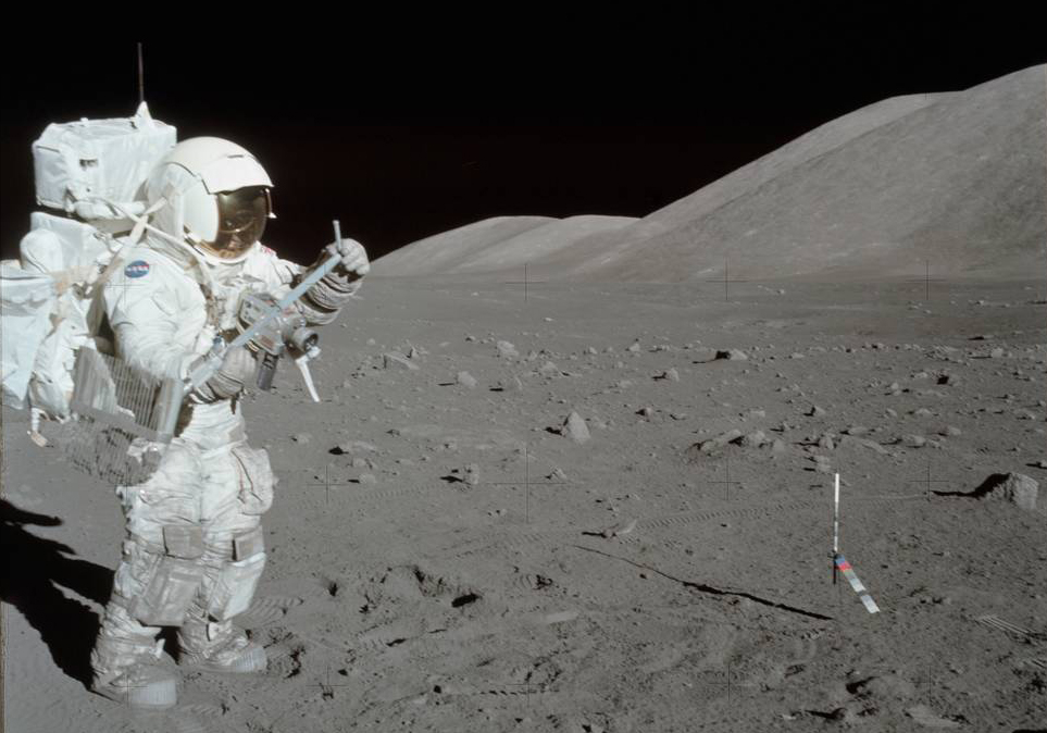 11 December 1972 -- Scientist-astronaut Harrison H. Schmitt collects lunar rake samples at Station 1 during the first Apollo 17 extravehicular activity (EVA) at the Taurus-Littrow landing site. Schmitt is the lunar module pilot. The Lunar Rake, an Apollo Lunar Geology Hand Tool, is used to collect discrete samples of rocks and rock chips ranging in size from one-half inch (1.3 cm) to one inch (2.5 cm).
Credits: Eugene A. Cernan, Apollo 17 Commander Image credit: None