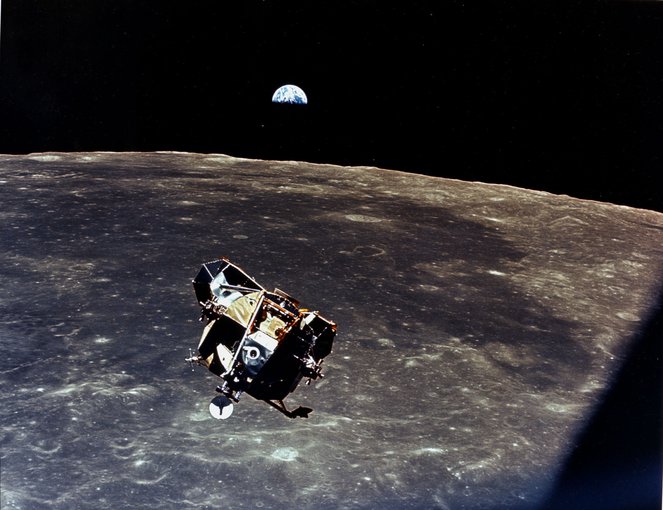The first humans to walk on another world - Neil Armstrong and Buzz Aldrin - flying the ascent stage of their Lunar Module back to the Moon-orbiting Command and Service Module.  Apollo photographs of Earth, such as this one taken by Command Module pilot Michael Collins, helped launch the environmental movement and got us wondering about the habitability of other worlds.  Image Credit: Apollo 11 / NASA