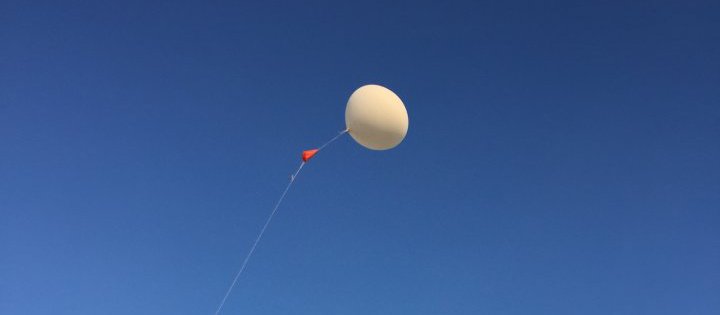 Example of a weather balloon being launched.