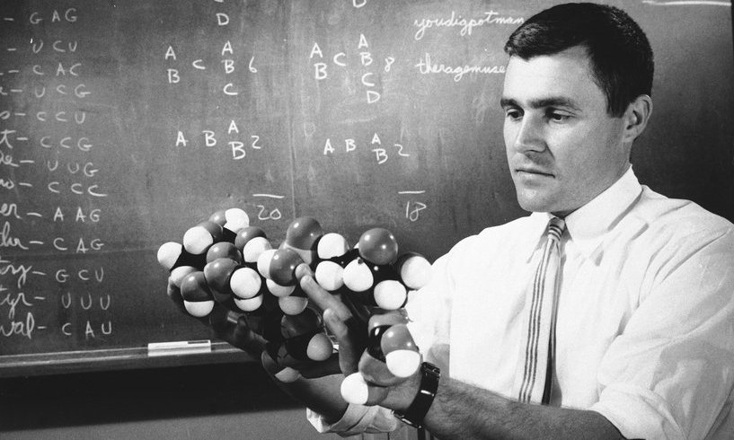 Woese with an RNA model at G.E. in 1961.