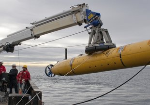 The autonomous underwater vehicle (AUV) Gulper being deployed on the R/V Rachel Carson in 2012.
