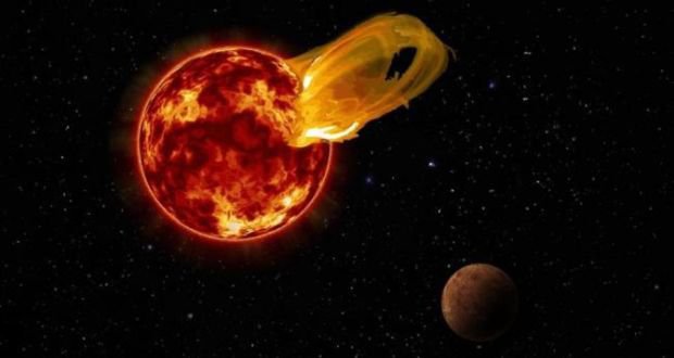 An artist’s impression of a flaring red dwarf star and a nearby planet.