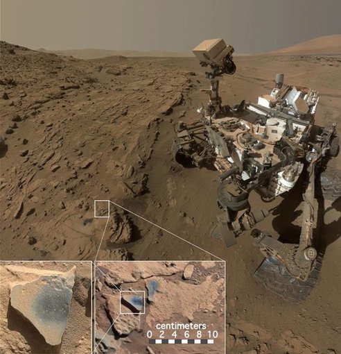 The Curiosity rover at the Windjana outcrop on Mars, where it found evidence of mangnese oxide on rocks and in rock fissures. The mineral is formed only in the presence of water and plentiful oxygen. (NASA)
