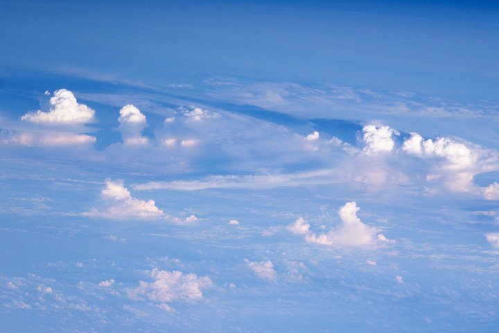 Evaporation, convection, rainfall and winds can even out heat imbalances in the atmosphere. Here, cumulus clouds carry solar energy away from Earth’s surface over South America.