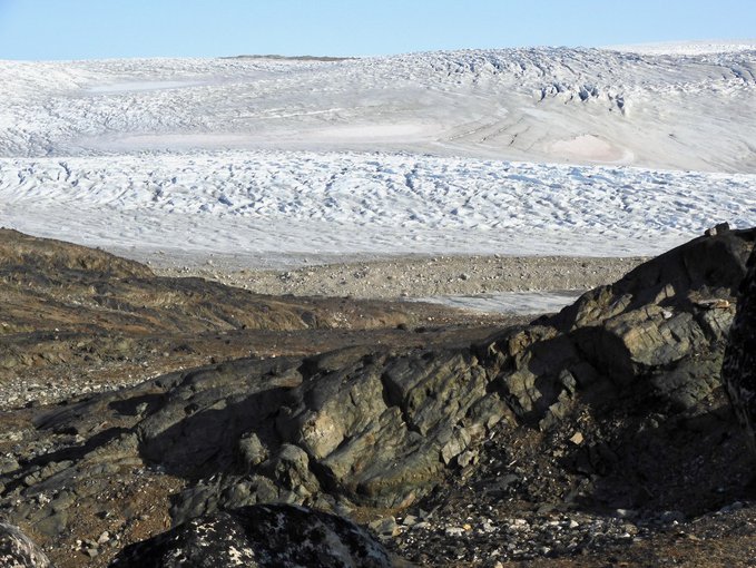 On the other  side of the ridge from Site A is the beginning of the Greenland Ice Sheet. Notice the twisted rocks, a feature of the intense past geological activity in the Isua area.
