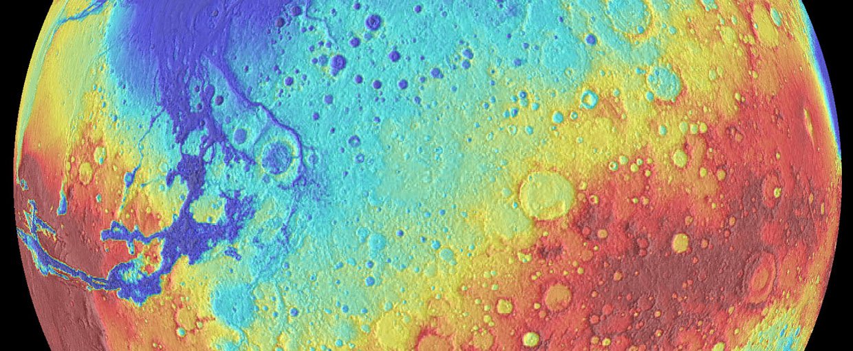 Mars topographic map. The northern hemisphere (blue) is mostly smooth lowlands and has experienced extensive volcanism. The southern hemisphere (orange) has an older, cratered highland surface. This dichotomy could have been caused by a giant impact.