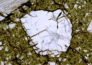 Lunar zircon brought back by astronauts from the Apollo 17 mission. Photo credit: Apollo 17/Nicholas E. Timms.