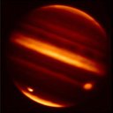 These infrared images obtained from NASA's Infrared Telescope Facility in Mauna Kea, Hawaii, show particle debris in Jupiter's atmosphere after an object hurtled into the atmosphere on July 19, 2009.