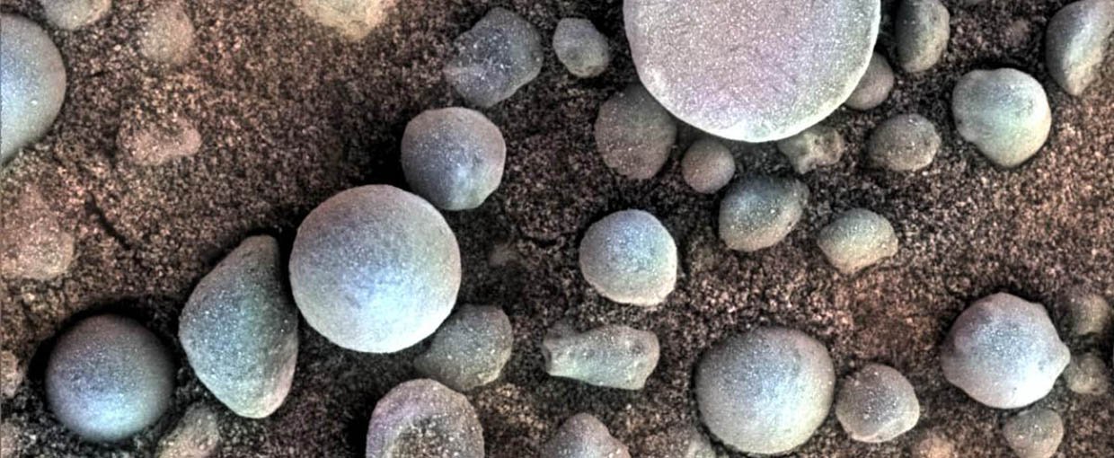 The small spherules on the Martian surface in this close-up image are near Fram Crater, visited by NASA's Mars Exploration Rover Opportunity during April 2004. These are examples of the mineral concretions nicknamed "blueberries."