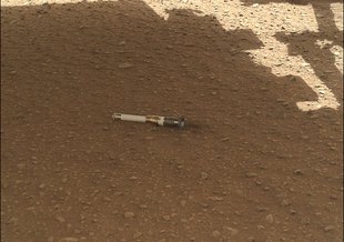 Once the team confirmed the first sample tube was on the surface, they positioned the WATSON camera located at the end of the rover’s robotic arm to peer beneath the rover, checking to be sure that the tube hadn’t rolled into the path of the wheels.