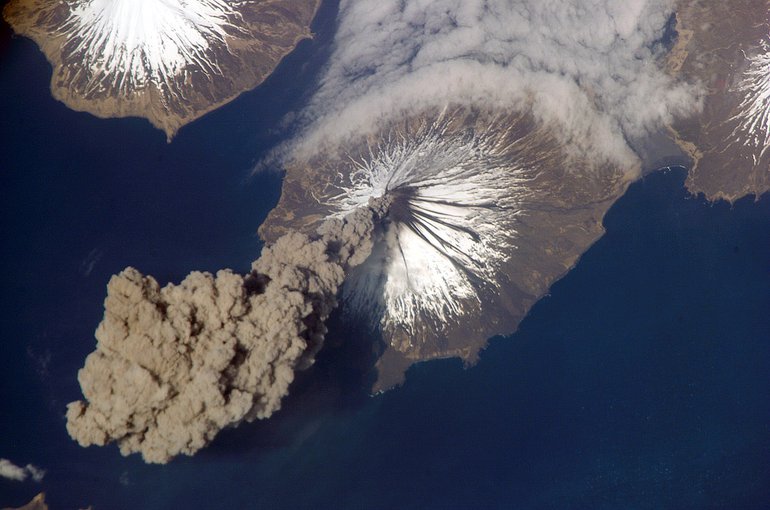 The erupting Cleveland Volcano in Alaska’s Aleutian Islands, captured by International Space Station astronauts in 2006. Earth has a “secondary atmosphere” produced in part by volcanoes. Credit: NASA