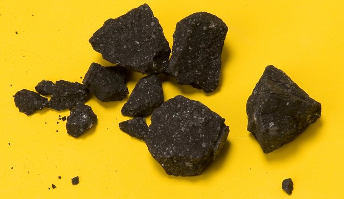 Fragments of the Sutter’s Mill meteorite fall collected by NASA Ames and SETI Institute meteor astronomer Peter Jenniskens in the evening of Tuesday April 24, 2012, two days after the fall. This was the second recovered find.