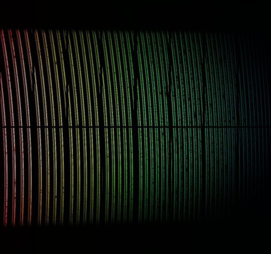 Spectral data from the first light of the ESPRESSO instrument on ESO’s Very Large Telescope in Chile. The light from a star has been dispersed into its component colors. This view has been colorised to indicate how the wavelengths change across the image.