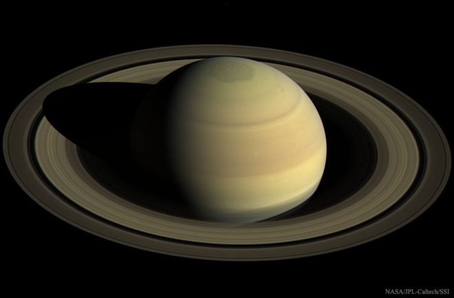 Saturn as imaged from above by Cassini last year. Over the next five months, the spacecraft will orbit closer and closer to the planet and will finally plunge into its atmosphere. (NASA)