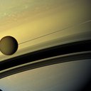 This Cassini image from 2012 shows Titan and its host planet Saturn.