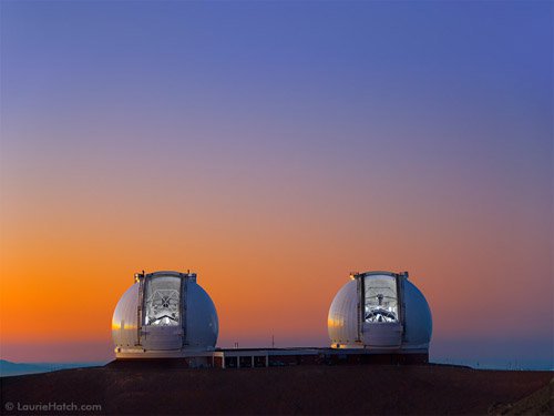 The sun sets on Mauna Kea as the twin Kecks prepare for observing.