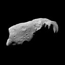 This view of the asteroid 243 Ida is a mosaic of five image frames acquired by the Galileo spacecraft's solid-state imaging system at ranges of 3,057 to 3,821 kilometers on August 28, 1993.
