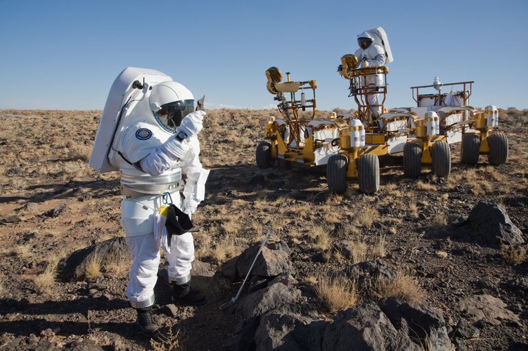 A NASA team practices techniques that could be used for astronauts on Mars. Sample return missions will help determine what sites on Mars can be safely visited. Credit: NASA