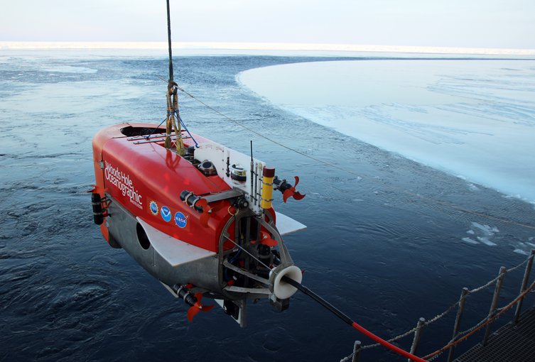 WHOI’s Nereid Under Ice (NUI) submersible being lowered into the water.