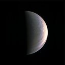 NASA's Juno spacecraft captured this view as it closed in on Jupiter's north pole, about two hours before closest approach on Aug. 27, 2016.