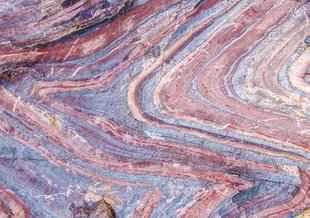 Rocks at Soudan Underground Mine State Park, Minnesota, show banding caused by layers of different minerals in a sample 2.7 billion years old. Credit: University of Wisconsin-Madison, http://news.wisc.edu/23863