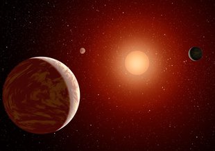 Artist rendering of a red dwarf or M star, with three exoplanets orbiting. About 75 percent of all stars in the sky are the cooler, smaller red dwarfs. (NASA)