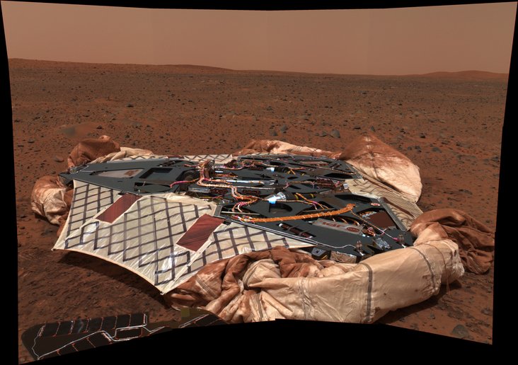 This image mosaic taken by the panoramic camera onboard the Mars Exploration Rover Spirit shows the rover's landing site, the Columbia Memorial Station, at Gusev Crater, Mars.