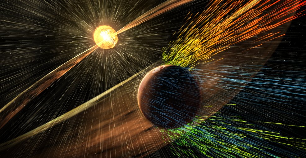 Artist’s rendering of a solar storm hitting Mars and stripping ions from the planet's upper atmosphere. Credits: NASA/GSFC