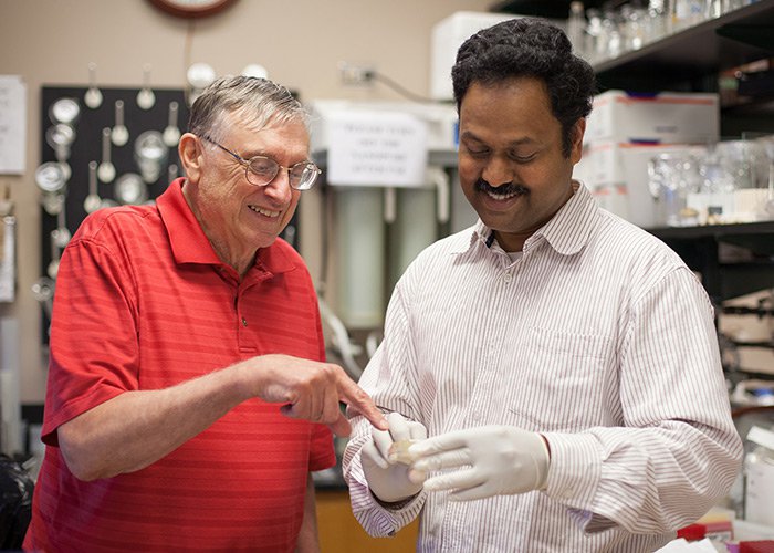 George Fox (left) and Madhan Tirumalai in University of Houston’s Department of Biology and Biochemistry.