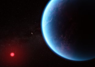 Artist concept shows a blue, hazy planet. The planet is in the foreground to the right of frame in closeup. Hints of land mass can be seen through the haze. In the distance (lower left) is a dim, red dwarf star.