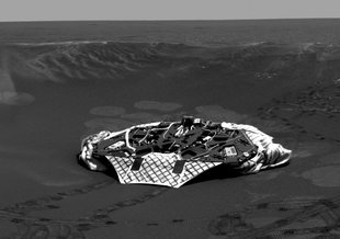 This image mosaic shows a panoramic view of the crater where Opportunity made its its dramatic arrival in late January 2004.
