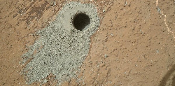 Curiosity drilled into this rock target, “Cumberland,” during the 279th Martian day, or sol, of the rover’s work on Mars (May 19, 2013) and collected a powdered sample of material from the rock’s interior.