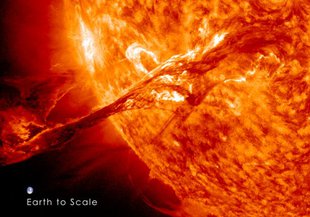 A 2012 coronal mass ejection from the sun. Earth is placed into the image to give a sense of the size of the solar flare, but our planet is of course nowhere near the Sun.