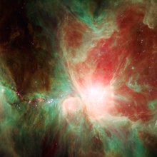 This stunning false-color view spans about 40 light-years across the region, constructed using infrared data from the Spitzer Space Telescope.