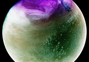 In this UV image of Mars, the planet appears greenish with a bright purple patch around the northern pole.