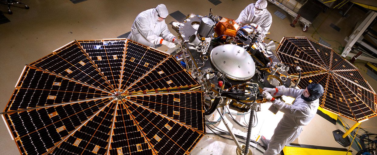 The solar arrays on NASA's InSight lander are deployed in this test inside a clean room at Lockheed Martin Space Systems, Denver. This configuration is how the spacecraft will look on the surface of Mars. The image was taken on April 30, 2015.
