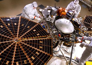 The solar arrays on NASA's InSight lander are deployed in this test inside a clean room at Lockheed Martin Space Systems, Denver. This configuration is how the spacecraft will look on the surface of Mars. The image was taken on April 30, 2015.