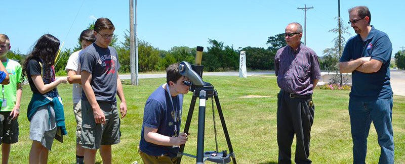 Andrew Mattioda, Space and Planetary Scientist at NASA Ames, and Carl Rutledge, Professor at East Central University, guide CNASA students in viewing solar prominences. Credit: NASA Space Science