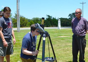 Andrew Mattioda, Space and Planetary Scientist at NASA Ames, and Carl Rutledge, Professor at East Central University, guide CNASA students in viewing solar prominences. Credit: NASA Space Science