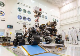 In a clean room at NASA's Jet Propulsion Laboratory in Southern California, engineers observed the first driving test for NASA's Mars 2020 rover on Dec. 17, 2019.